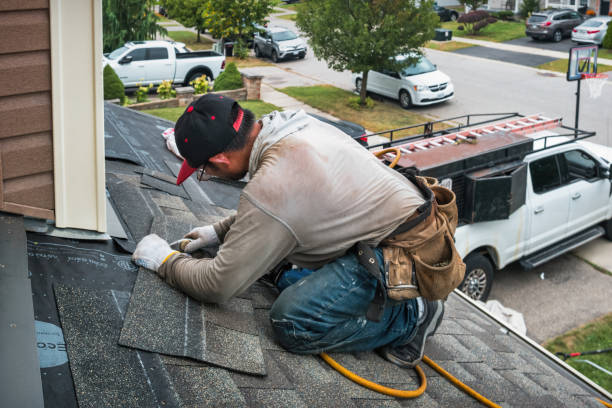 Professional Roofing technician working in Port Orford, OR